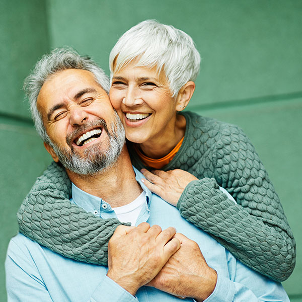 elder couple smiling